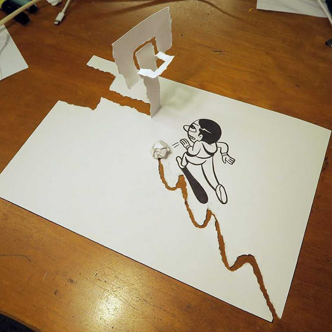 Cet illustrateur crée des scènes en 3D amusantes avec de simples feuilles blanches #2