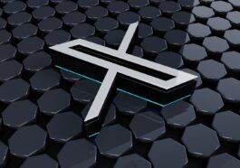 a cross on a black surface surrounded by hexagonal hexagonals